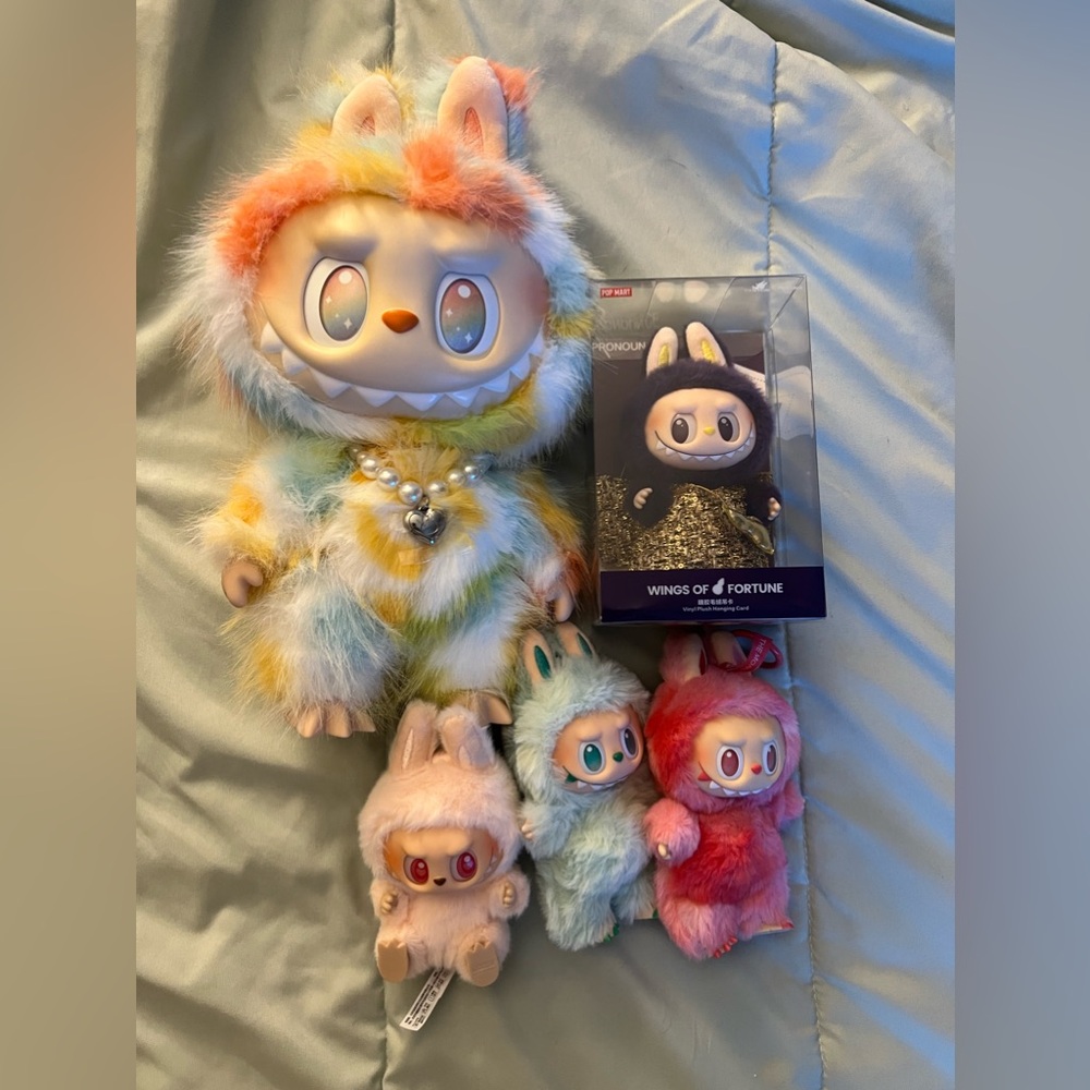 Set of 5 labubus. Including rock the universe big plush